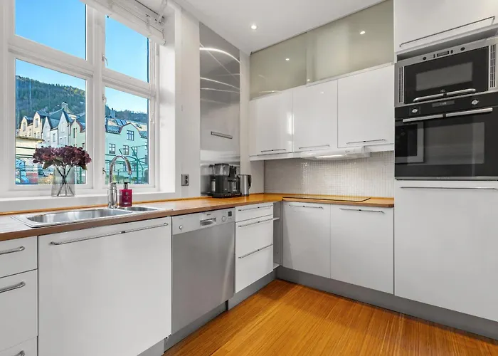 Sentral Og Stilfull *